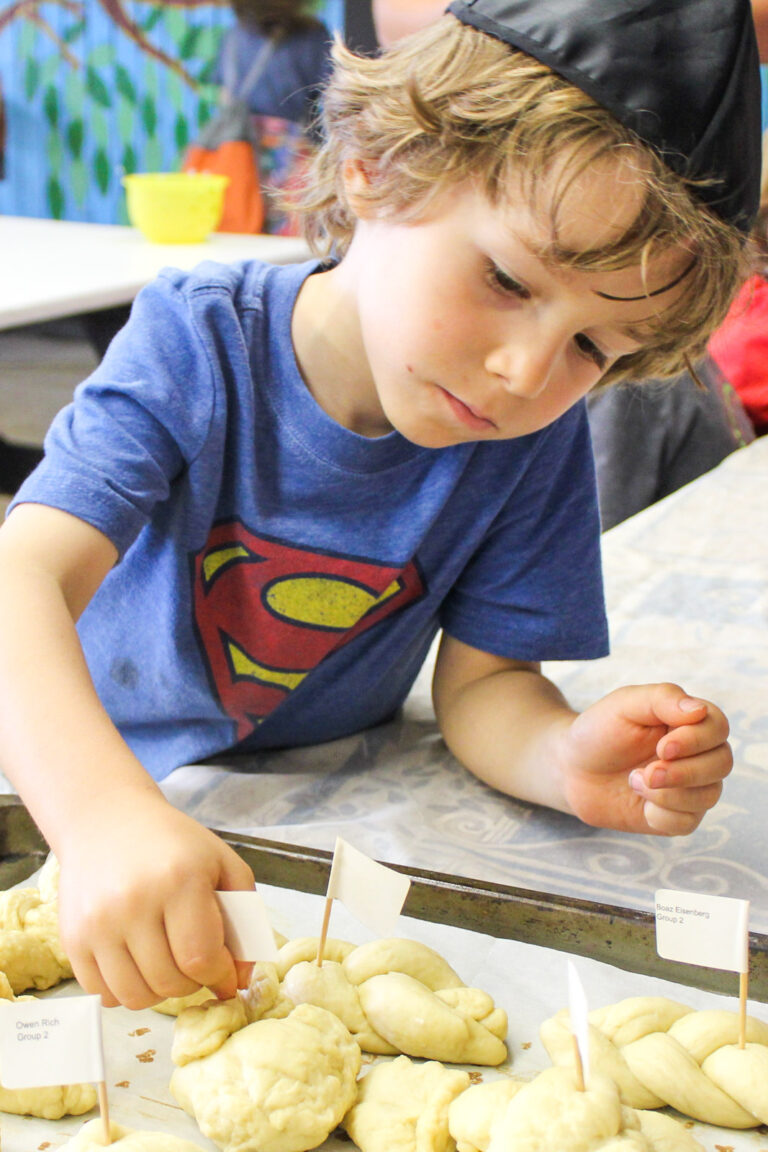 A boy focusing.