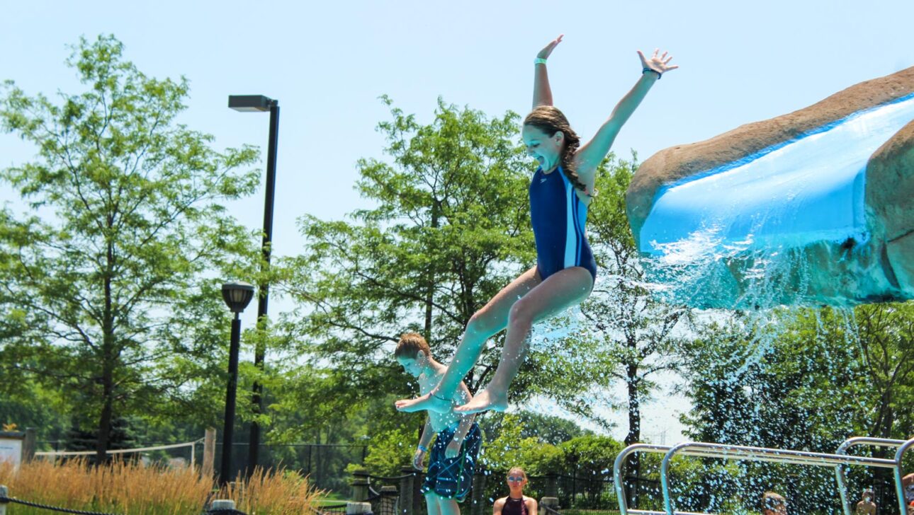 Kids on a waterslide.